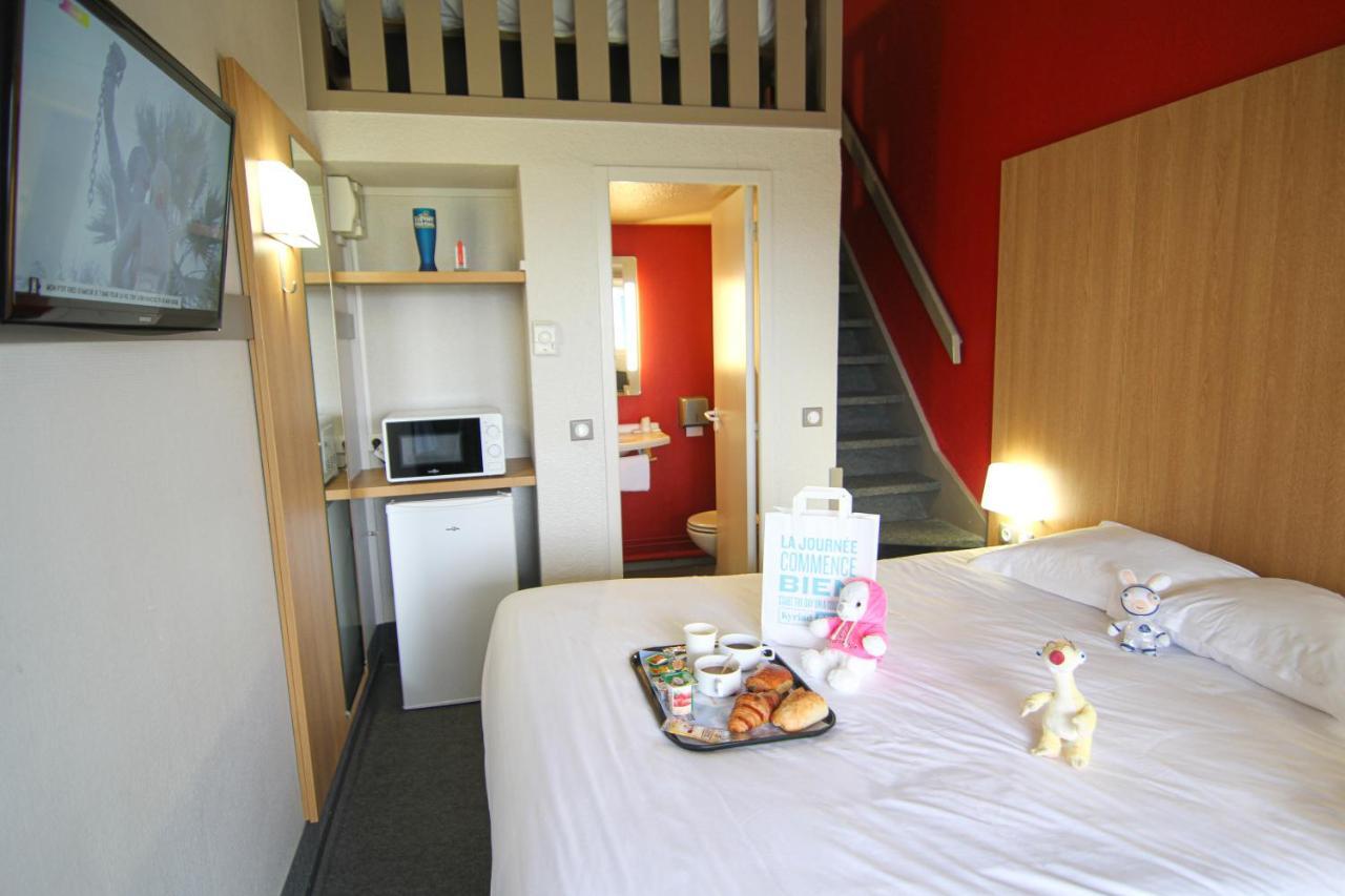 Kyriad Direct Poitiers - Gare Du Futuroscope Чассенеуил-Ду-Поитоу Экстерьер фото