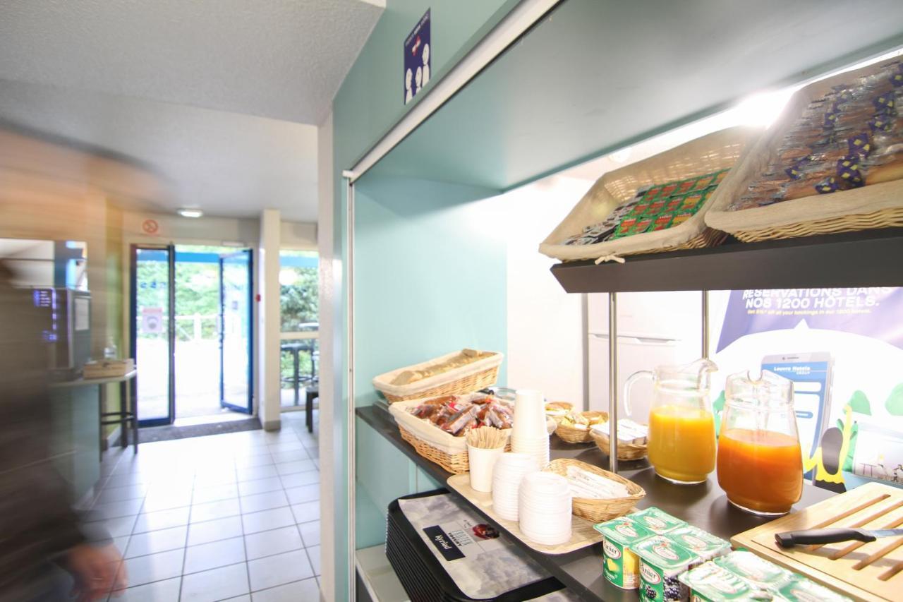 Kyriad Direct Poitiers - Gare Du Futuroscope Чассенеуил-Ду-Поитоу Экстерьер фото